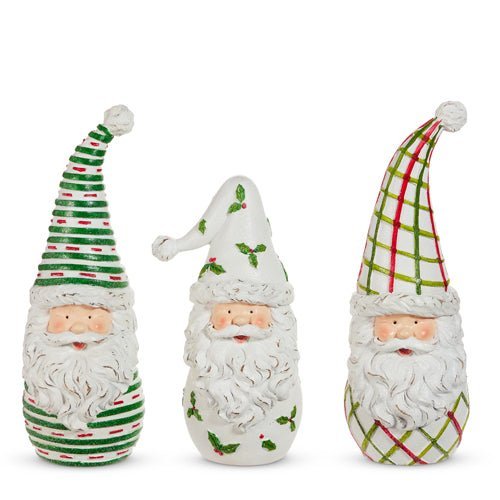 Three decorative gnomes with colorful hats on a white background