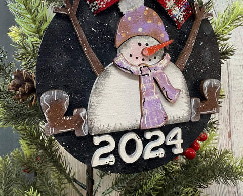 Setting Snowman Ornament    