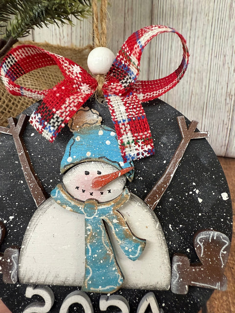 Setting Snowman Ornament    