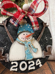 Setting Snowman Ornament  Blue 2024  