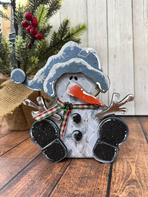 Whimsical Sitting Snowman    