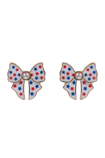 Bow-shaped earrings with star pattern on a white background