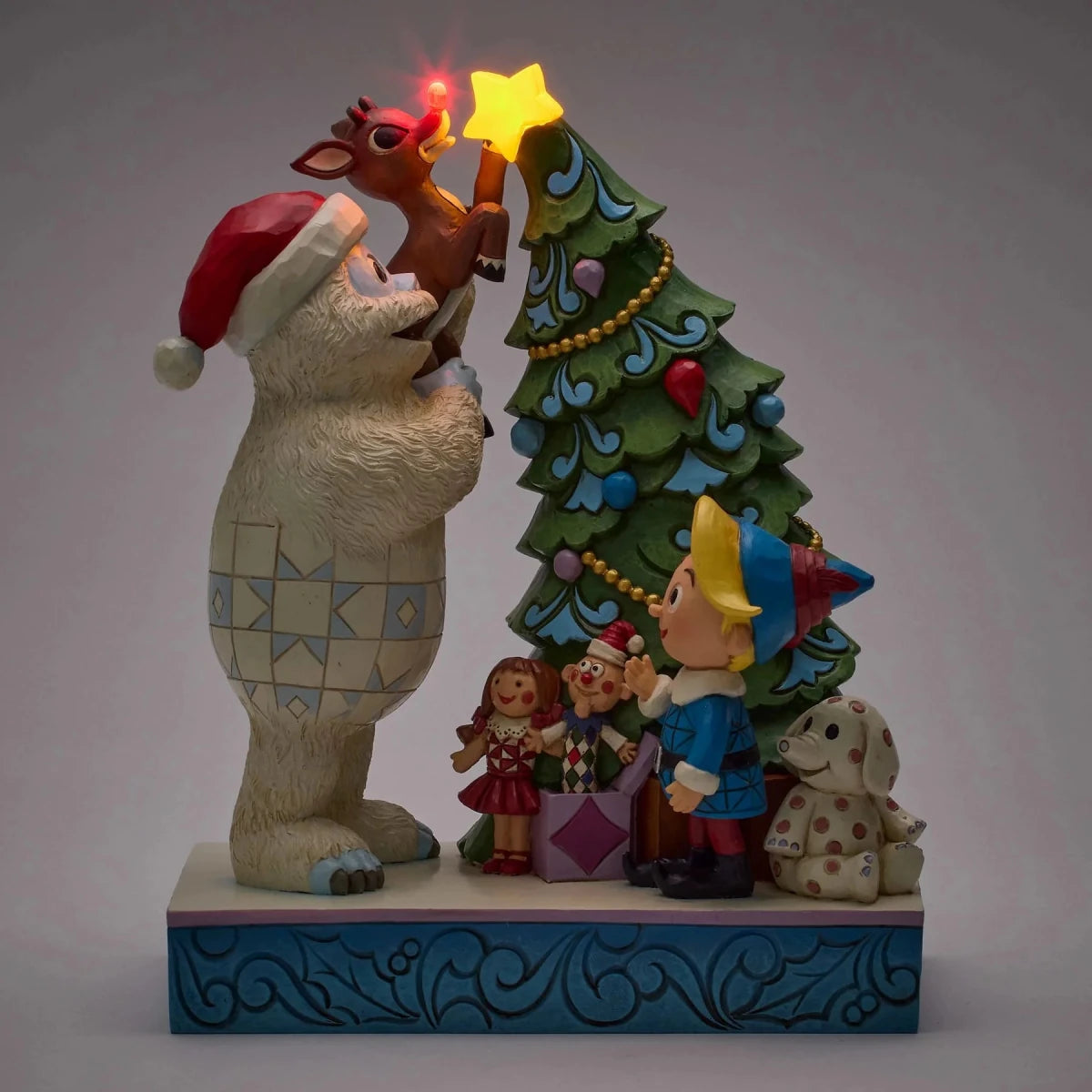 Bumble Holding Rudolph by Tree - Nifty Decor & More