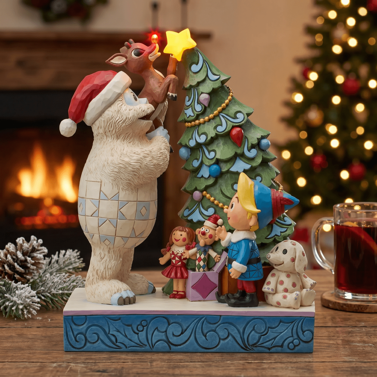 Bumble Holding Rudolph by Tree - Nifty Decor & More