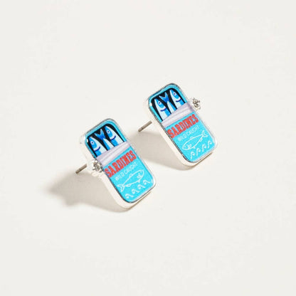 Pair of earrings with blue and red design on a white background