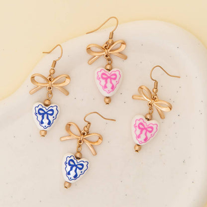 Ceramic Heart Charm Dangle Earrings with Bow Accent