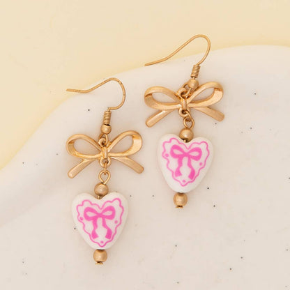 Ceramic Heart Charm Dangle Earrings with Bow Accent Pink