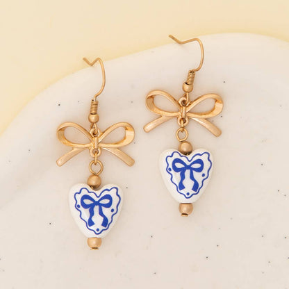 Ceramic Heart Charm Dangle Earrings with Bow Accent Blue