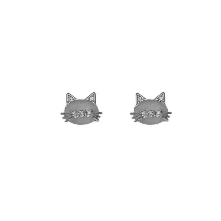 Cat-shaped earrings on a white background