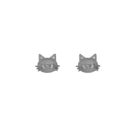 Cat-shaped earrings on a white background