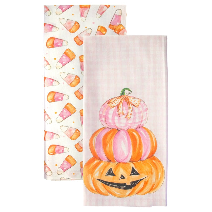 Two folded cotton kitchen towels with a light pink gingham pattern. The front towel features a stack of three watercolor pumpkins (a jack-o'-lantern on the bottom, a striped pink pumpkin in the middle, and a striped pink pumpkin on top with a bow).
