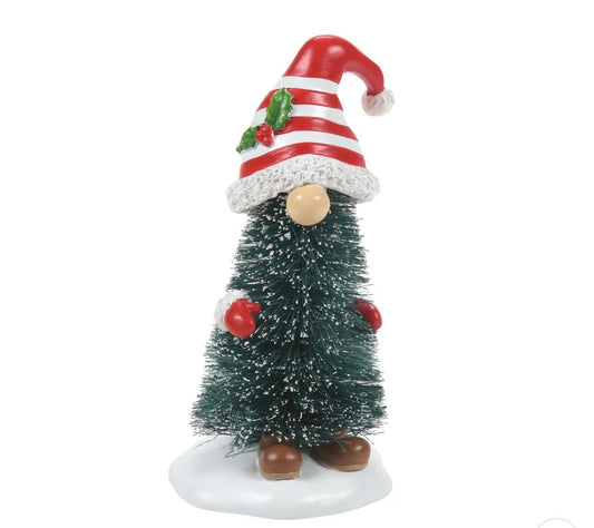 Decorative Christmas gnome with a tree body on a white background