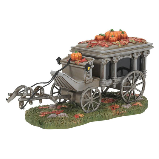 Model of a wagon with pumpkins on a white background