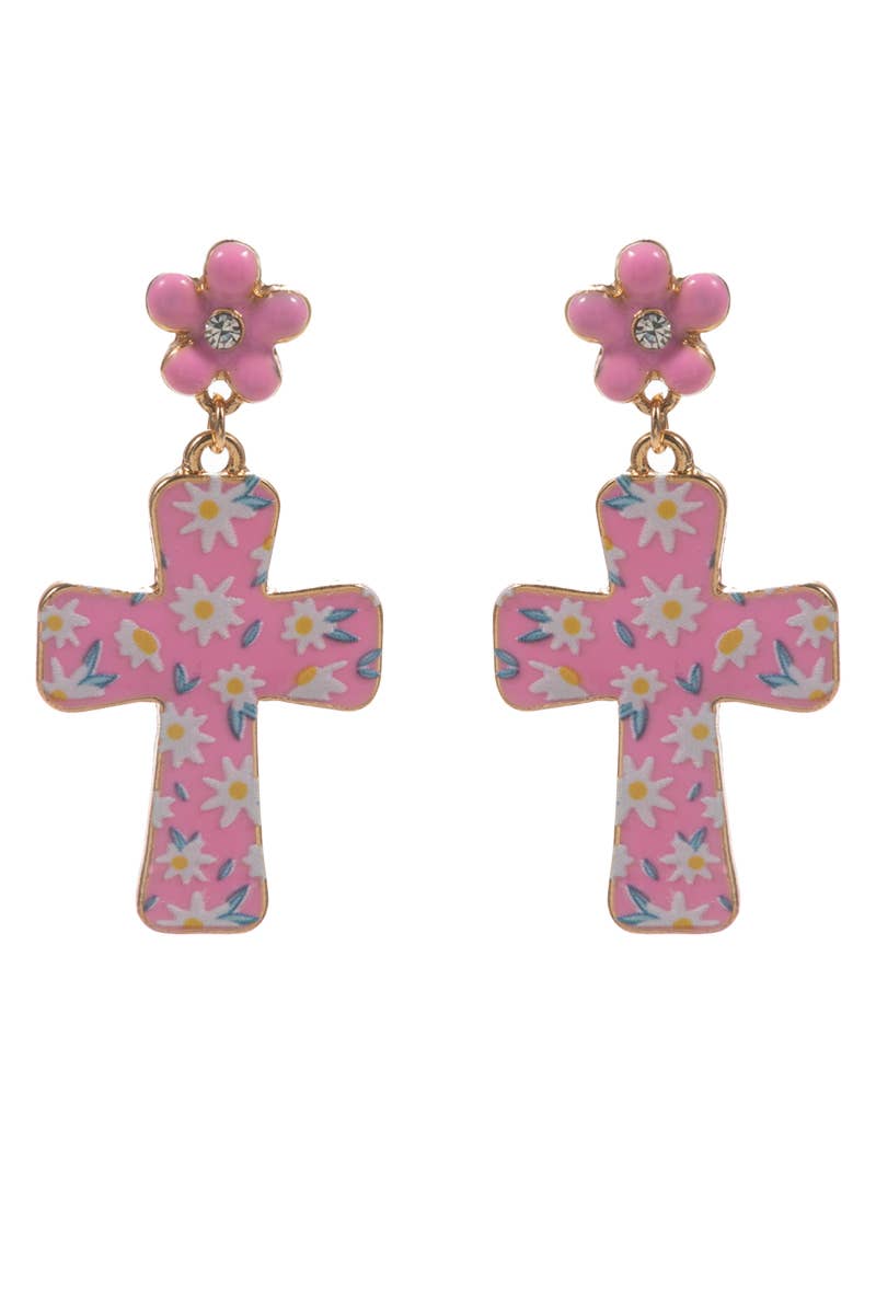 Pink cross-shaped earrings with floral designs on a white background