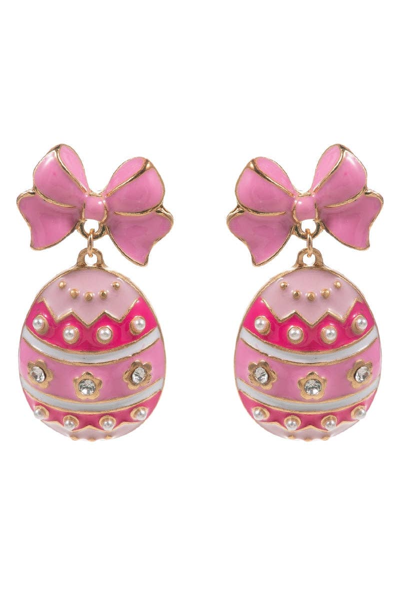 Pink egg-shaped earrings with bow details on a white background