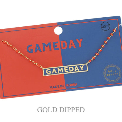 Gold-dipped 'GAMEDAY' necklace on a red and blue card with 'MADE IN KOREA' text.