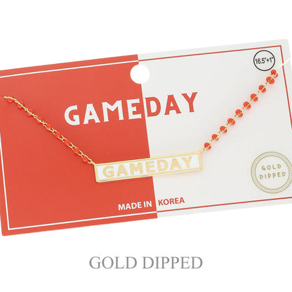 Gold 'GAMEDAY' necklace on a red and white card with 'MADE IN KOREA' text.