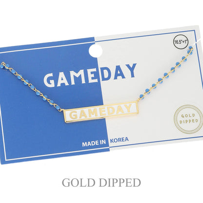 Gold 'GAMEDAY' necklace on a blue and white card with 'MADE IN KOREA' text.