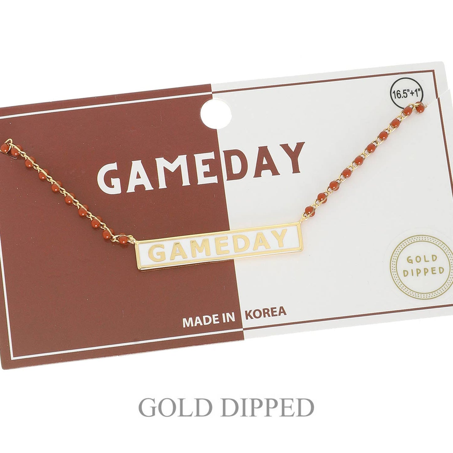 Gold 'GAMEDAY' necklace on a 'GAMEDAY' branded card with gold dipper text.