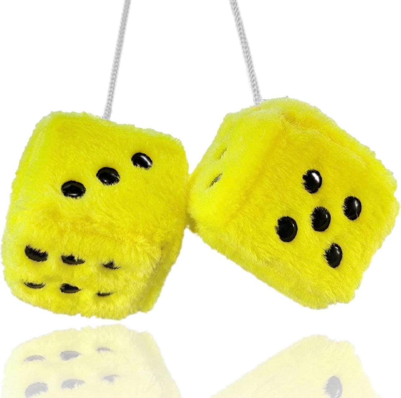 Two yellow dice-shaped plush toys with black dots on a white background