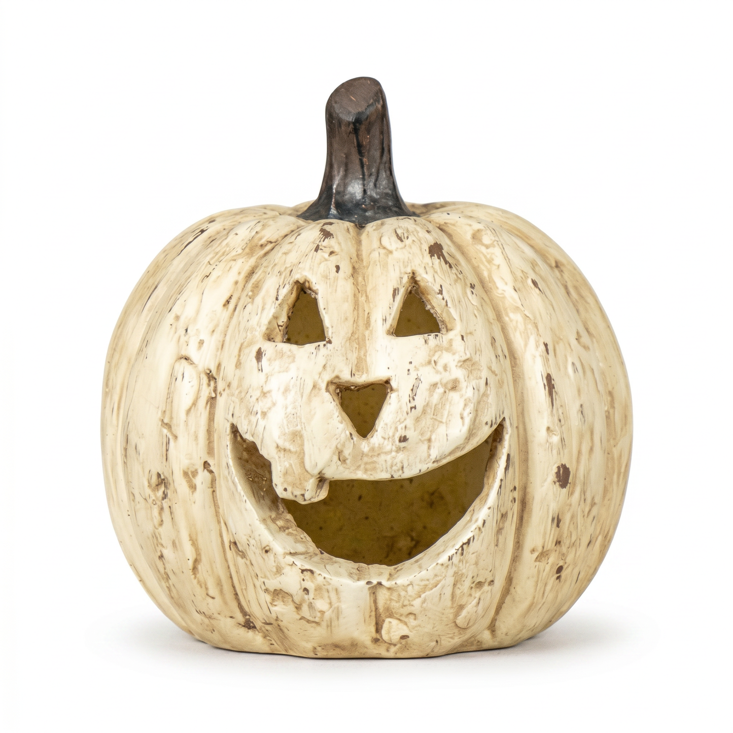 Decorative pumpkin with a carved face on a white background