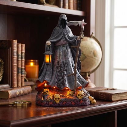 Statue of a hooded figure with a scythe and lantern on a desk with books and a globe in the background.