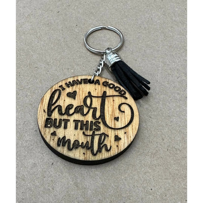 I have a Good Heart, But This Mouth Keychain Keychains Natural with black tassel  
