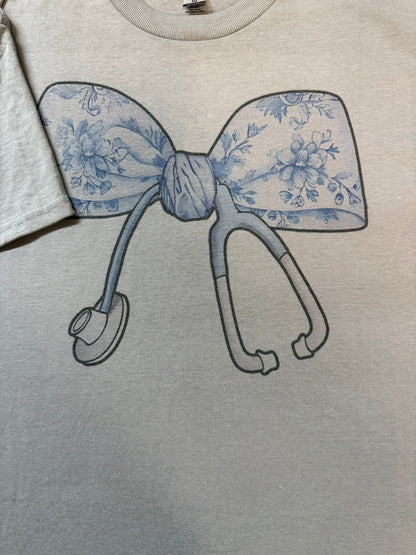 Nurse Coquette Bow T-shirt, Chic Chinoiserie Design, Casual Wear for Healthcare Heroes, Perfect Nurse Gift - Nifty Decor & More