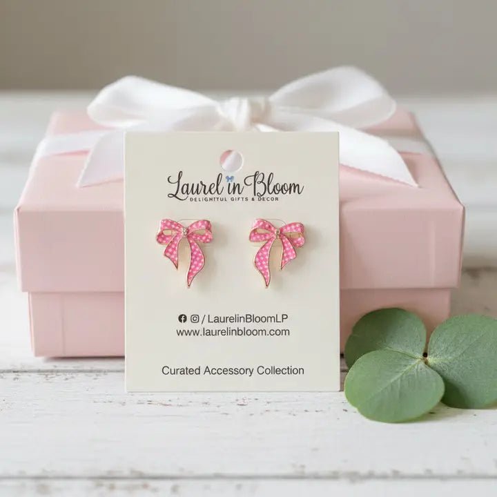 Pink bow earrings on a Laurel in Bloom card with a pink box in the background