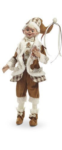 An Elf in festive attire with a white background holding a cookie