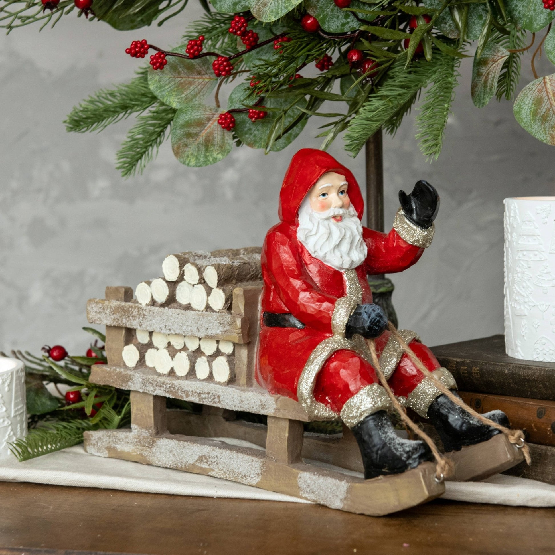 RED SLEDDING SANTA - Nifty Decor & More