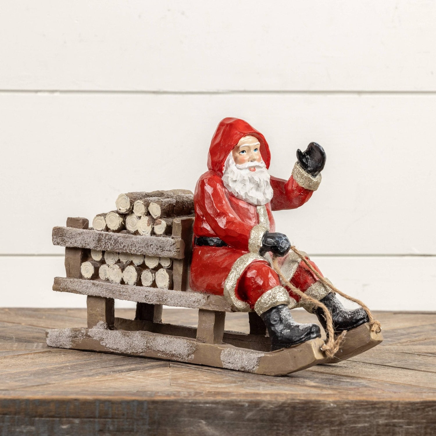 RED SLEDDING SANTA - Nifty Decor & More