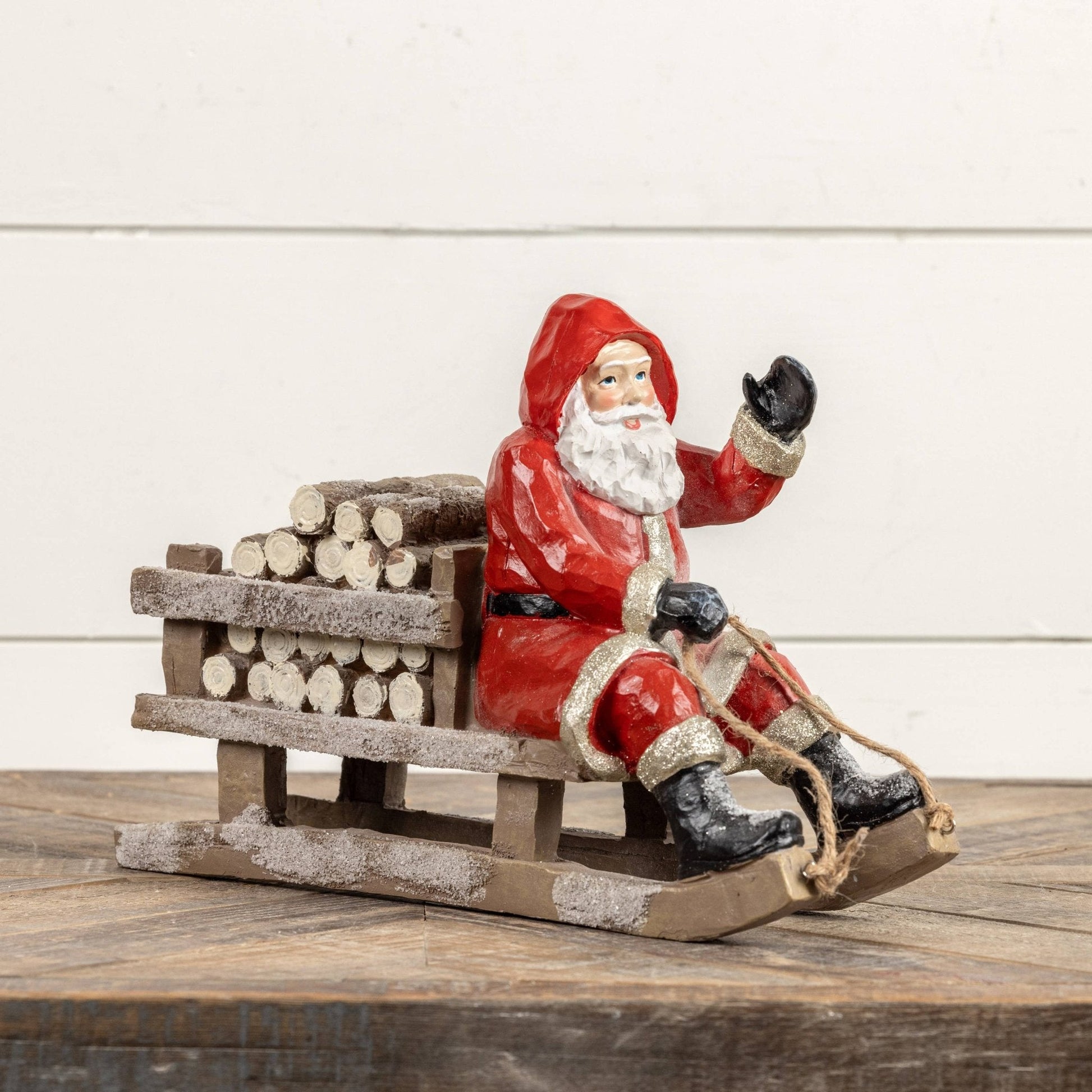 RED SLEDDING SANTA - Nifty Decor & More