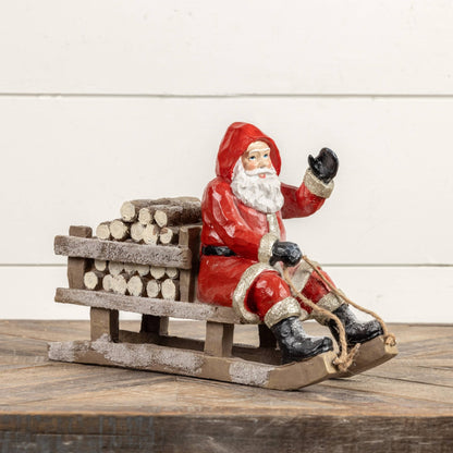 RED SLEDDING SANTA - Nifty Decor & More