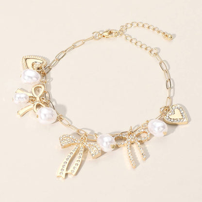 Stone Paved Bow Heart Pearl Charm Bracelet, Elegant Station Chain Jewelry for Everyday Wear, Perfect Gift for Her